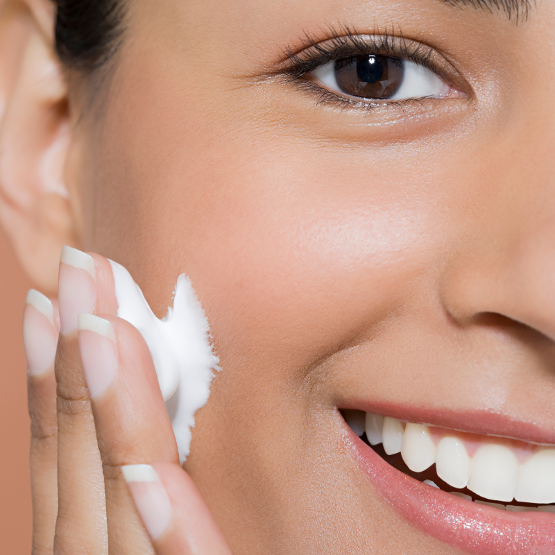 applying moisturiser or sunscreen on your skin
